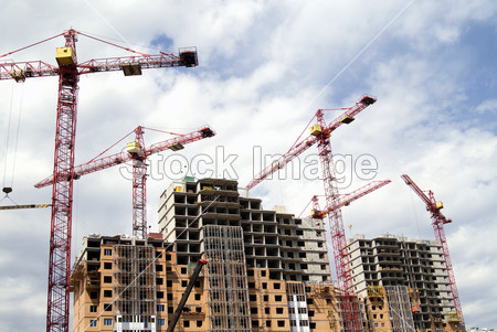 Building cranes and building houses