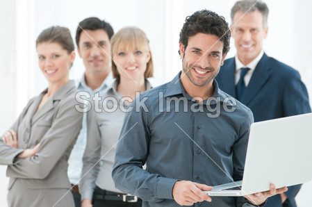 Business man holding a modern laptop