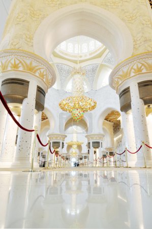 Abu Dhabi, UAE - June 4: Sheikh Zayed Grand Mosque interior inside and biggest in the world chandelier on June 4, 2012 in Abu Dhabi, UAE