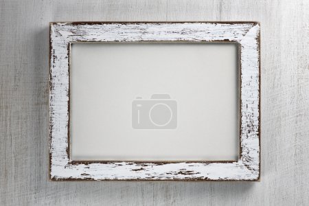 Vintage wooden frame on wall background