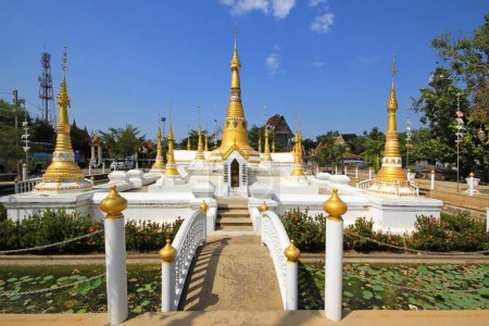 Wide angle view ,Golden pagodas in  Mon-style Chedi of Wat Chedi Thong, The temples architecture imitates the Burmese Chittakong stupa