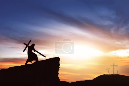 Silhouette of Jesus carry his cross