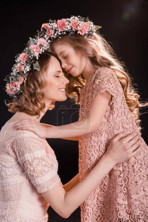 Mother and daughter in wreaths