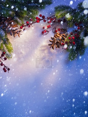 Blue snow Christmas background, frame of fir branches