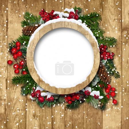 Christmas frame with decorations on a wooden background