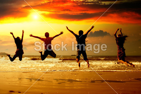 Young people silhouette in the beach