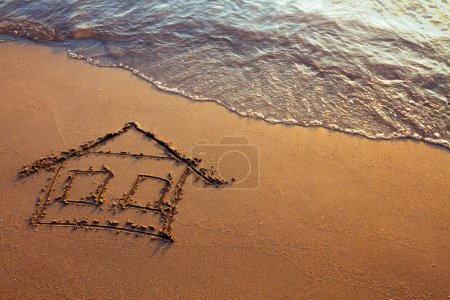 House painted on the sand
