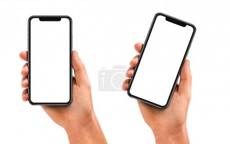 Man hand holding the black smartphone with blank screen and modern frame less design - isolated on white background