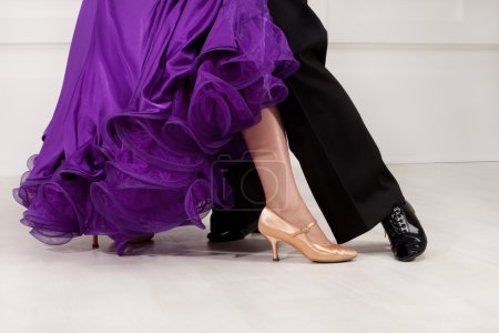 Feet partners on the dance floor