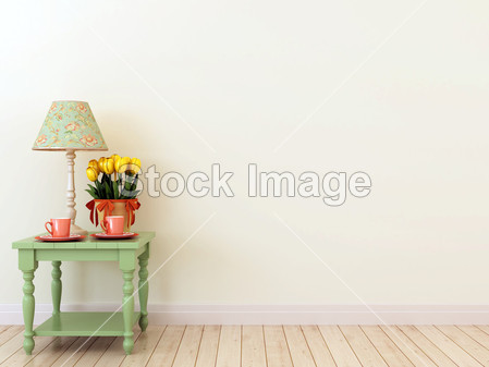 Green side table with the decor in the interior