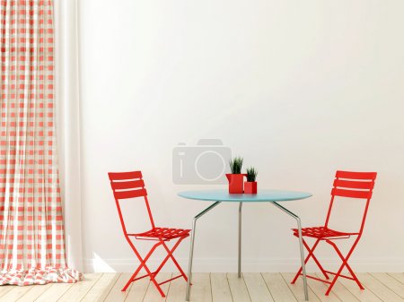 Table with two red chairs