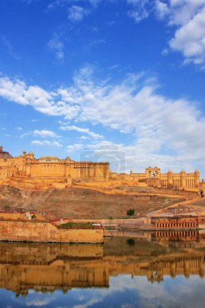 Amber Fort reflected in Maota Lake near Jaipur, Rajasthan, India. Amber Fort is the main tourist attraction in the Jaipur area.