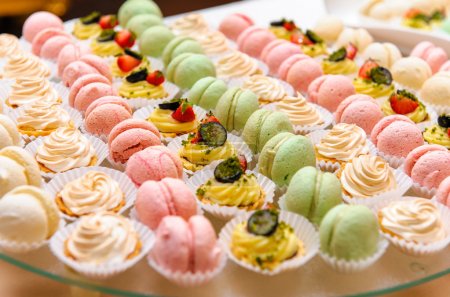 Tray with delicious cakes and macaroon