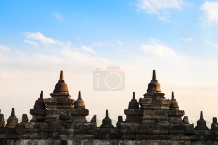 Borobudur Temple wall at sunrise. Indonesia.