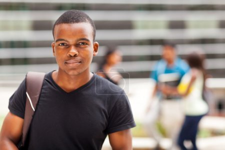 african college boy standing outdoors