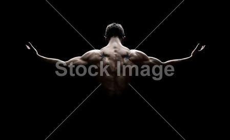Rear view of healthy young muscular man