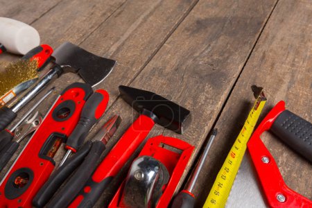close up of Assorted work tools on wood background