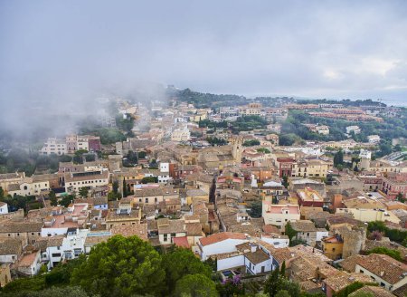 Begur, Spain - September 15, 2018. Medieval downtown of Begur in the fog. View from the Castle of Begur. Girona, Costa Brava, Catalonia, Spain.