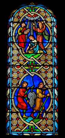 Monaco - November 13, 2018: Stained Glass in the Cathedral of Monaco, depicting Holy Communion with the Body and Blood of Christ