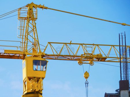 Crane. Tower crane against blue sky. Crane. Construction site.