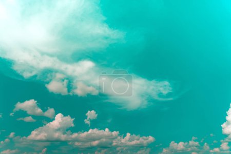 Copy space summer blue sky and white cloud with light flare from sun abstract background.