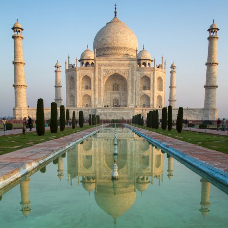 A perspective view on Taj Mahal mausoleum with reflection in wat