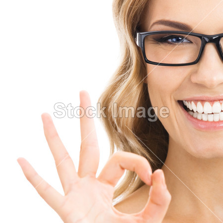 Businesswoman with okay gesture, isolated