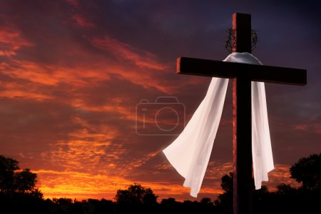 Dramatic Lighting on Christian Easter Crucifixion Cross At Sunrise