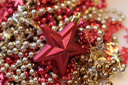 New Years shiny flickering beads,christmas vibrant decor details macro photo bokeh lights