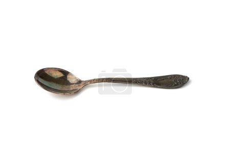metal vintage small coffee spoon for pouring sugar isolated on a white background