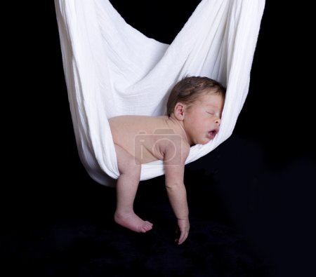 Baby Sleeping in White Hammock Sling