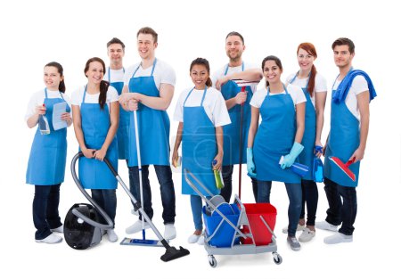Large diverse group of janitors with equipment