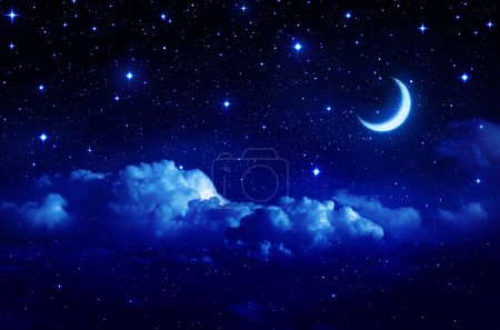 Starry sky with half moon in scenic cloudscape