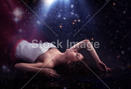 Sensual lady laying over romantic background