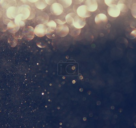 Silver and golden background of defocused abstract lights. bokeh lights.