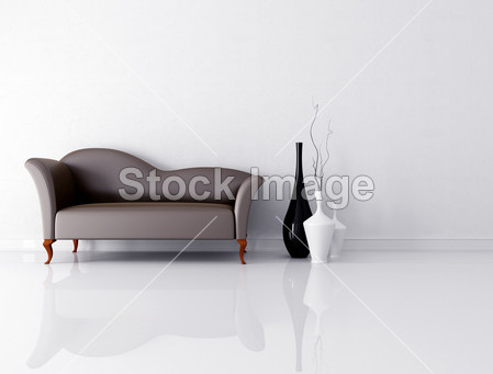 Brown couch in a white room
