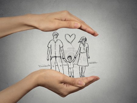 woman's hands protecting happy family