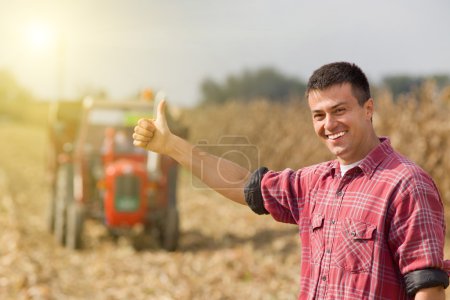 Satisfied farmer in field
