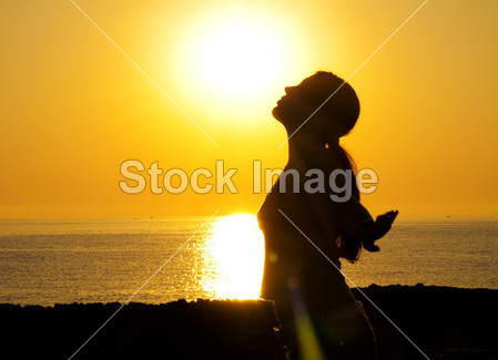 Woman silhouette in the sun