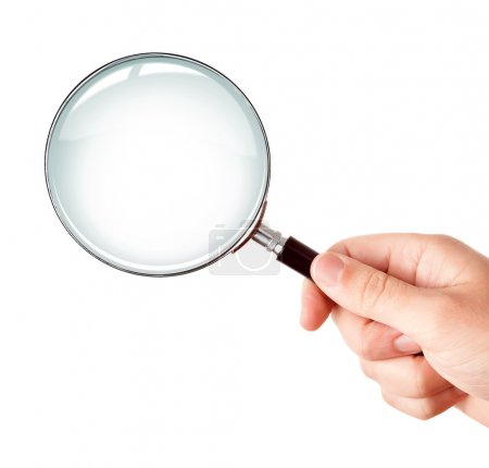 Magnifying glass in hand isolated