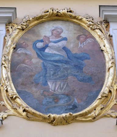 Virgin Mary fresco painting on the house facade in Graz, Austria