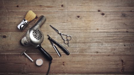 Vintage barber equipment on wood desk