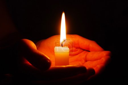 Candle in a hand