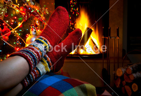 Romantic winter evening by the fireplace Christmas and Christmas tree