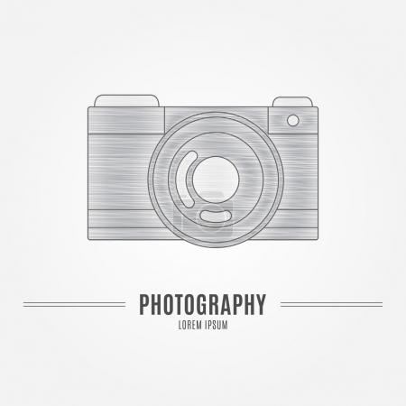 Old camera - branding identity element, isolated on white backgr