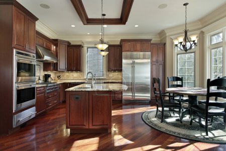 Luxury kitchen with cherry wood cabinetry