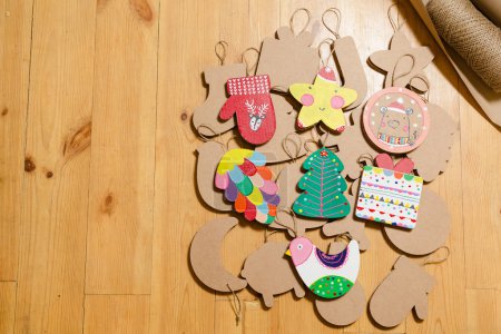 Cardboard toys for the Christmas tree or garland. New year decorations.