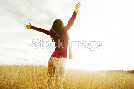 girl spreading hands with joy