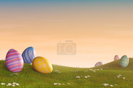 Decorated Easter eggs in a grassy hilly landscape at sunset